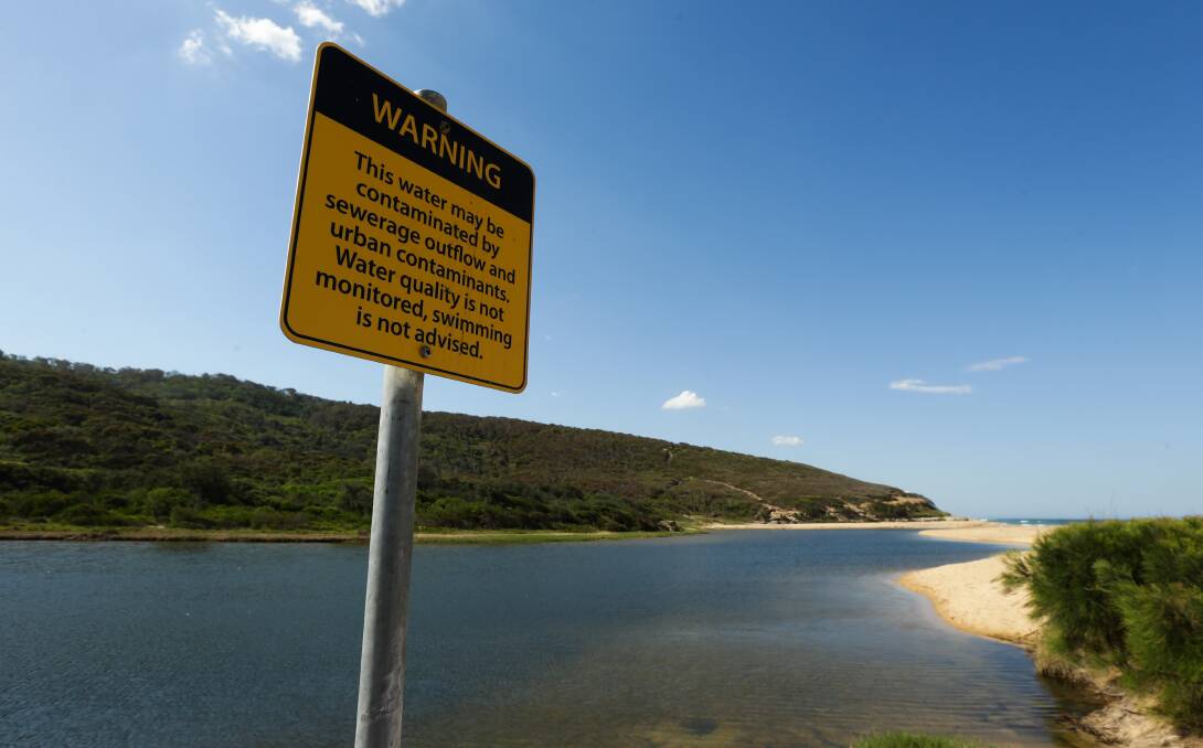 Warning sign on the edge of Glenrock Lagoon. Picture: Jonathan Carroll