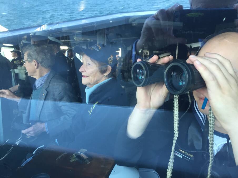 REFLECTING: John and Margaret McNaughton on the bridge of HMAS Newcastle. Picture: Scott Bevan