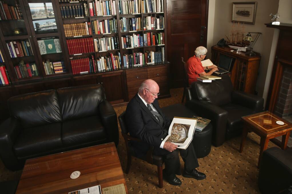 WORDS WORK: Ken Dutton and Gwen Hamilton in the club's library lounge.  Picture: Marina Neil