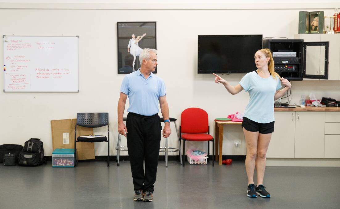 Dance teacher Rachel Mackie helps Scott Bevan put his best foot forward. Picture: Max Mason-Hubers