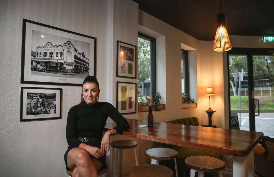 Star Hotel venue manager Ali Pultar, with photos of how the pub used to be. Picture: Marina Neil 