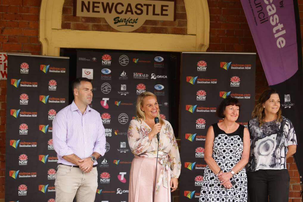 Newcastle Lord Mayor Nuatali Nelmes, flanked by her Port Stephens and Lake Macquarie counterparts, speaking at the Surfest 2019 launch. Picture: Jonathan Carroll 