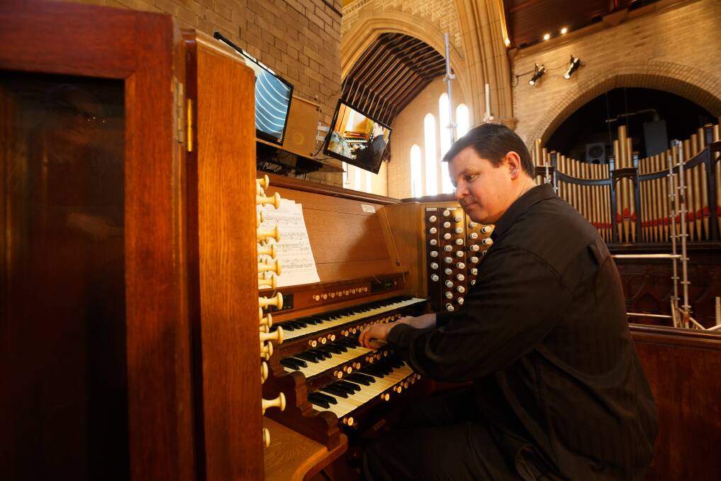 Christ Church Cathedral organist Peter Guy performing as part of the 2019 Newcastle Music Festival. Picture: Max Mason-Hubers