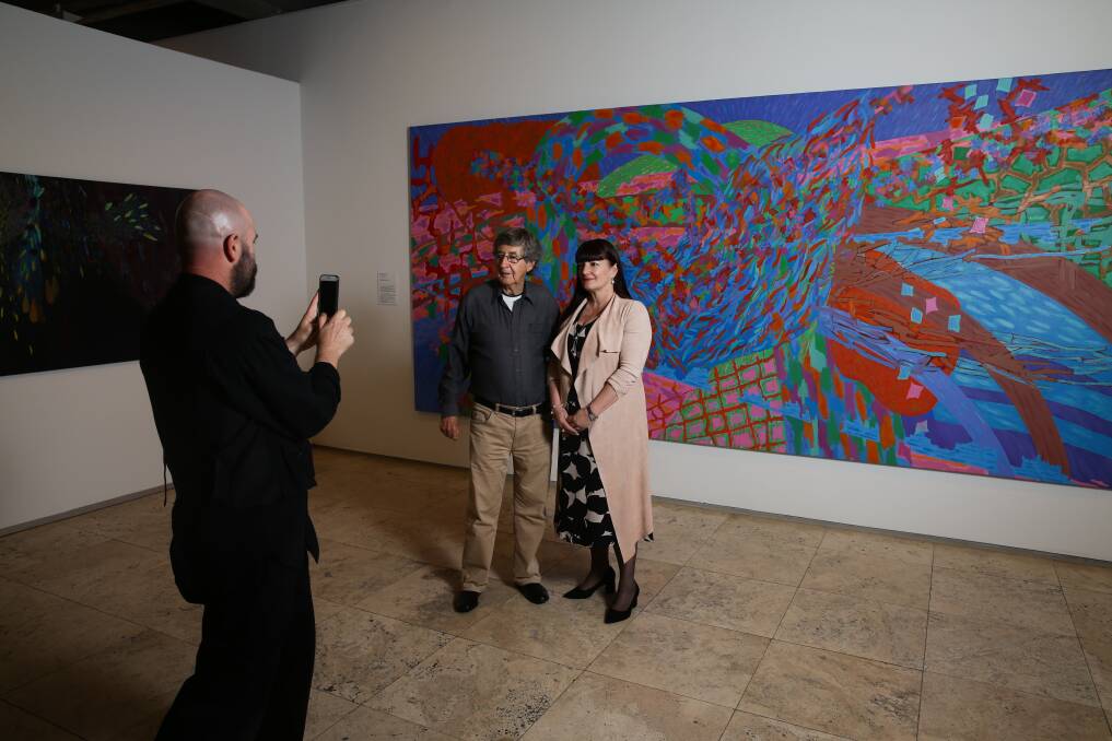 Former gallery director David Thomas has his photo taken with the present director of Newcastle Art Gallery, Lauretta Morton. Picture: Jonathan Carroll 