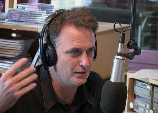 ON AIR: Paul Bevan behind the microphone in 2004. Picture: Supplied