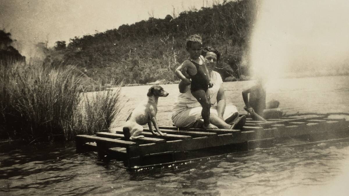 Glan Willcox as a small boy rafting on the lagoon with his mother, brother and dog in the 1930s. Picture courtesy: Glanmor Willcox 