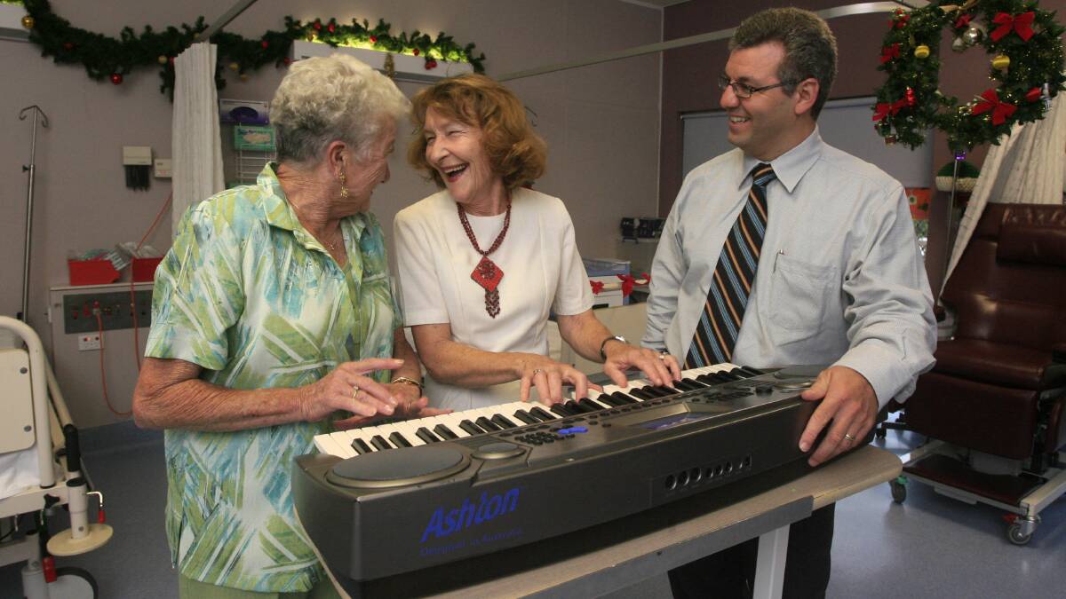 HARMONY: Margaret McNaughton playing the keyboards at a function at John Hunter Hospital in 2007.