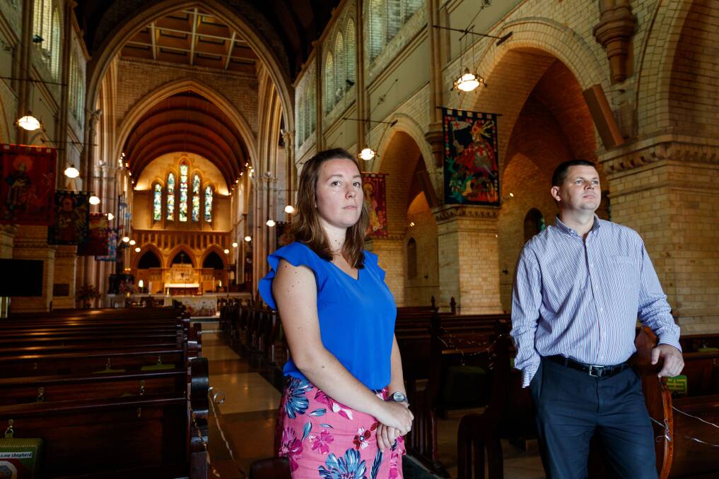 Veronica Butcher, a member of Christ Church Cathedral's choir, and Peter Guy, Master of the Choristers, believe COVID rules should allow for group singing inside the large sacred space. Picture: Max Mason-Hubers. 