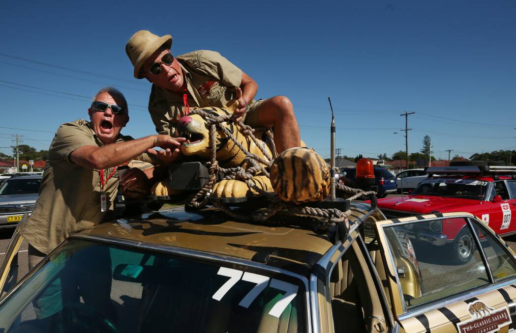 Mark Barlow and Marc Christowski on top of their car, The Jungle Brothers. Picture: Simone De Peak