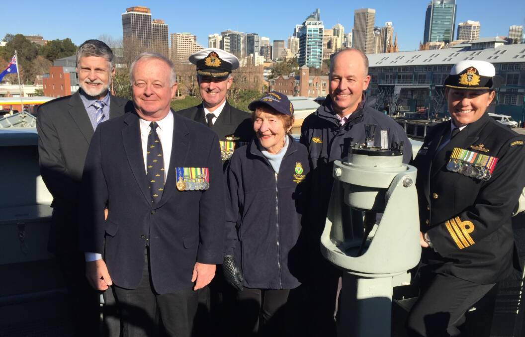 HISTORY: Margaret McNaughton, centre, with former commanding officers of HMAS Newcastle, Cmdr Steve Hamilton, Cdre Gerry Christian, Cdre Justin Jones, and Capt Nicholas Stoker, and present CO, Cmdr Anita Sellick