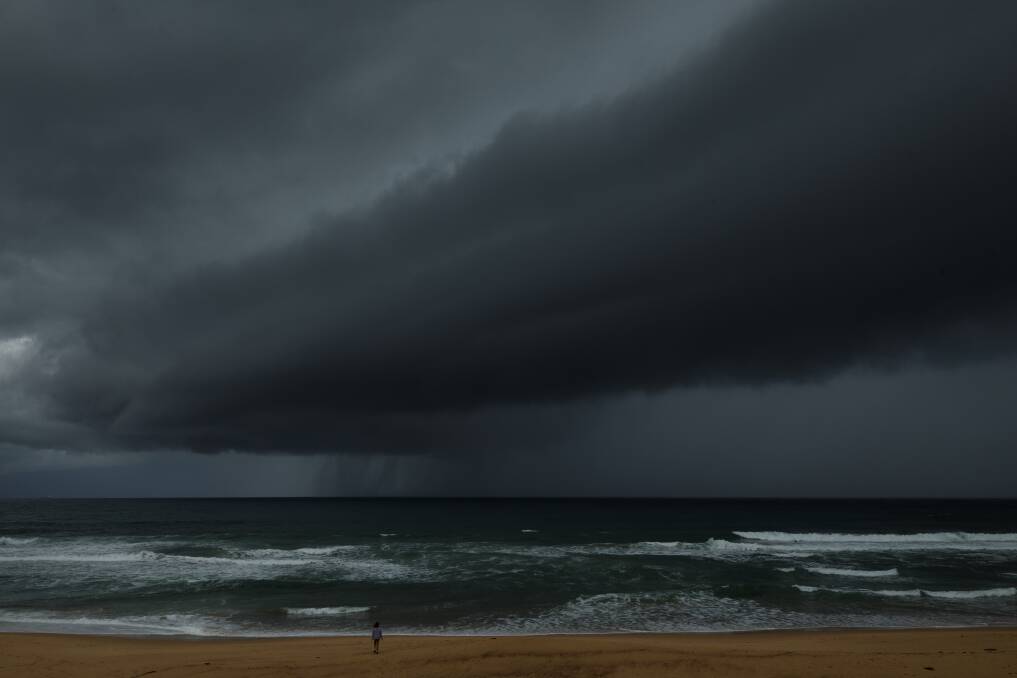 TURMOIL: A storm at sea rolling towards Merewether Beach. Picture: Max-Mason Hubers