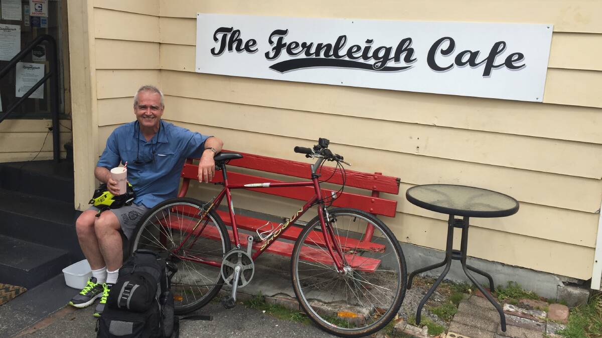 Scott Bevan takes a break at the Fernleigh Cafe in Adamstown. 