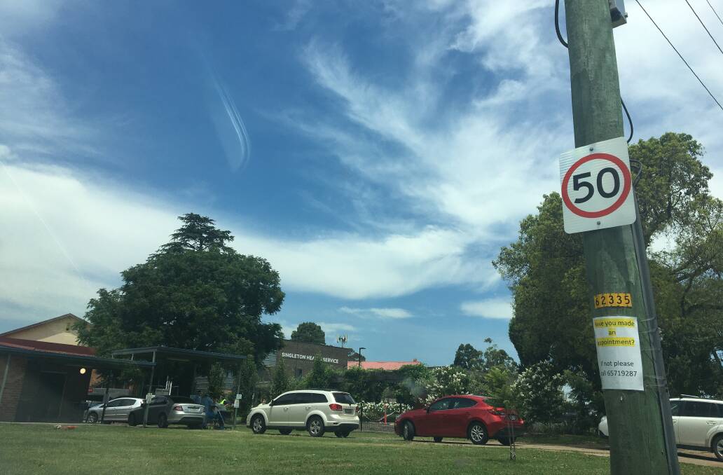 PATIENCE: A queue of vehicles at the Singleton Hospital's clinic in December, as people line up for for a COVID test. Picture: Louise Nichols 