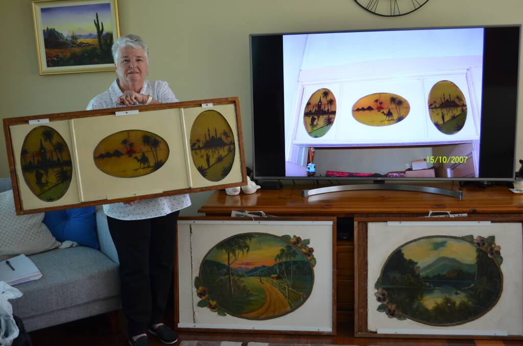 RESCUED: Local history researcher Vicki-anne Williamson with a selection of works by Ernie Dickson. Picture: Scott Bevan 