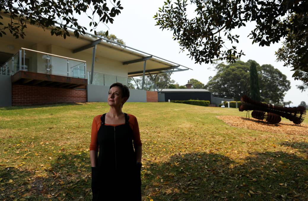 Museum of Art and Culture director Debbie Abraham outside the redeveloped gallery at Lake Macquarie. Picture: Simone De Peak