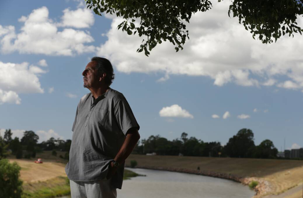 Author and environmental philosopher Glenn Albrecht on the banks of the Hunter River at Maitland. Picture: Simone De Peak 
