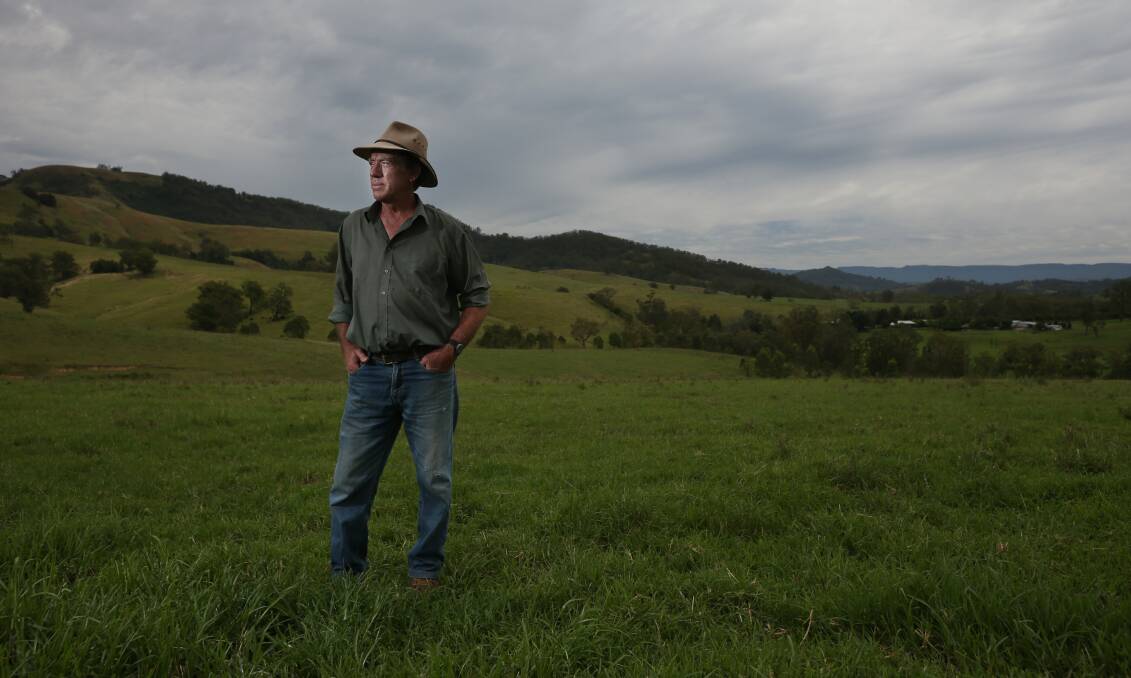 NOW: Peter Lawrence standing in the same paddock on his farm, 12 months on.