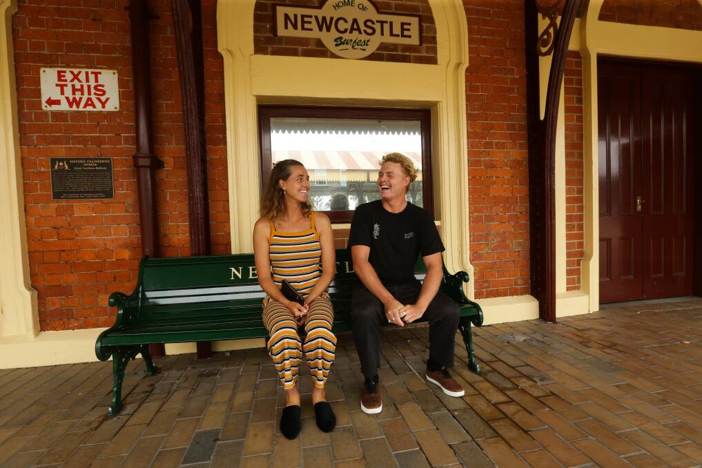 SWELL TIMES: Local elite boardriders Philippa Anderson and Jackson Baker at The Station in Newcastle for the launch of this year's Surfest competition, which is being held in February and March. Picture: Jonathan Carroll 