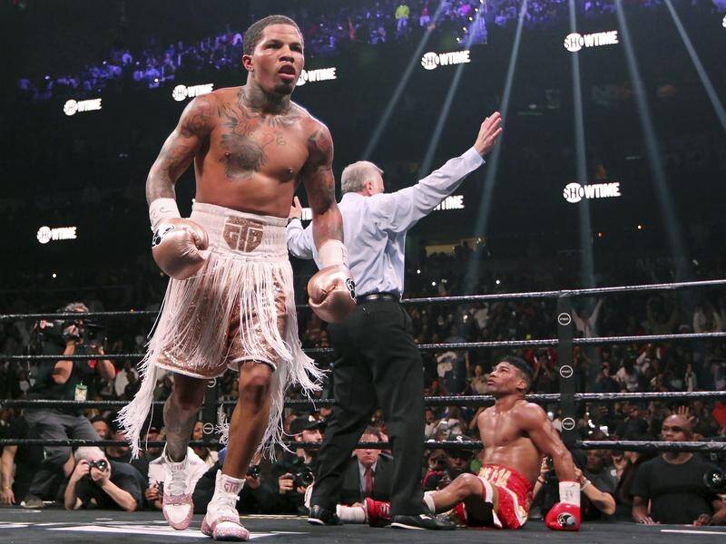 Gervonta Davis (l) heads to the corner after sending Yuriorkis Gamboa to the canvas.