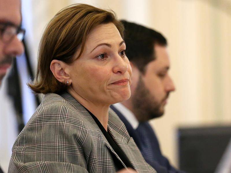 Jackie Trad will step aside if a commission investigates her purchase of a house near a project.