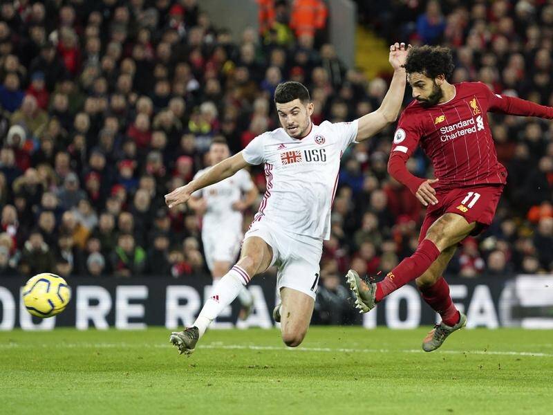 Mohamed Salah (right) has helped Liverpool extend their unbeaten run in the EPL to a second year.