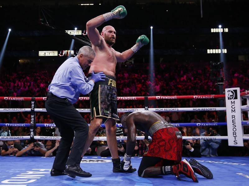 Tyson Fury has stopped Deontay Wilder in the 11th round to retain the WBC heavyweight title.