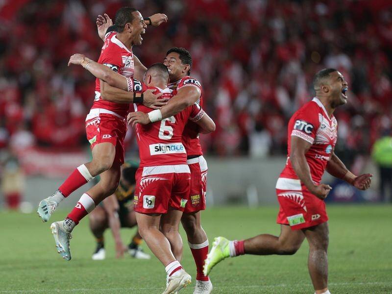 Tonga put off-field dramas behind them to defeat Australia in their last rugby league international.