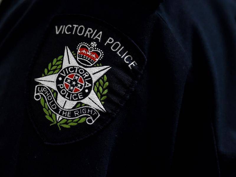 Victoria Police charged eight people over a pro-Palestinian protest on a Melbourne factory roof. (Tracey Nearmy/AAP PHOTOS)