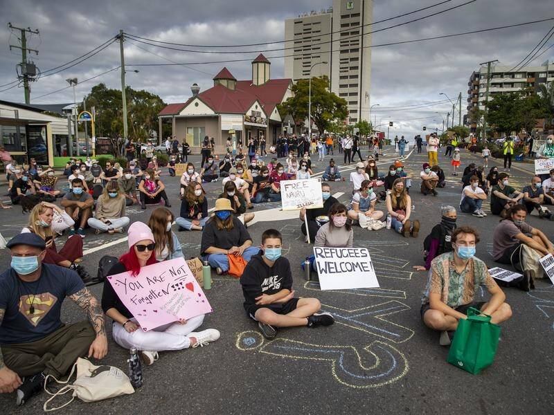 Protesters breached a two-hour limit for a Brisbane rally calling for the release of asylum seekers.