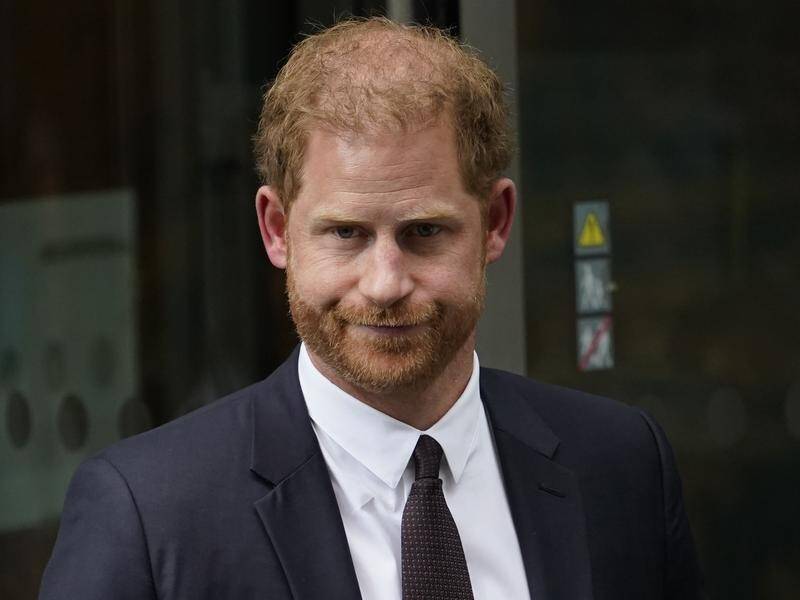 A judge says Prince Harry must pay the legal costs incurred by publisher Associated Newspapers. (AP PHOTO)