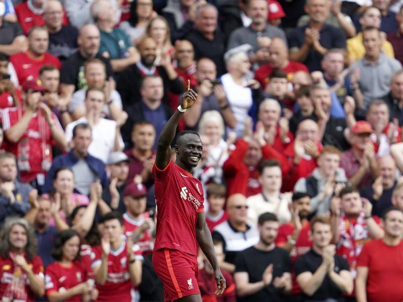 Sadio Mane, here celebrating his 100th Liverpool goal, has been hailed by club manager Jurgen Klopp.