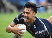 Jeremiah Nanai of the Cowboys celebrates a try in his side's big win over the Warriors. (Scott Radford-Chisholm/AAP PHOTOS)