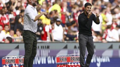 Manchester City boss Pep Guardiola (l) and Arsenal manager Mikel Arteta (r) will go head to head. (EPA PHOTO)