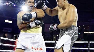 Alex Leapai Jr (r) faces a busy fight schedule, with up to eight bouts this year. (HANDOUT/DARREN BURNS / SLB FIGHT NIGHT)