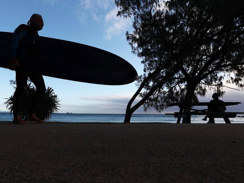Along with surfing and tourism, Byron Bay is also becoming known for its number of homeless. (JASON O'BRIEN/AAP PHOTOS)