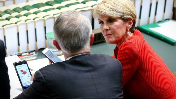  Malcolm Turnbull and Julie Bishop watch the US election results come in during question time on Wednesday. Photo: Alex Ellinghausen