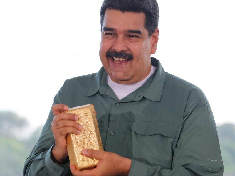 A UK court has rejected President Nicolas Maduro's bid to gain control of Venezuela's gold reserves. (EPA PHOTO)