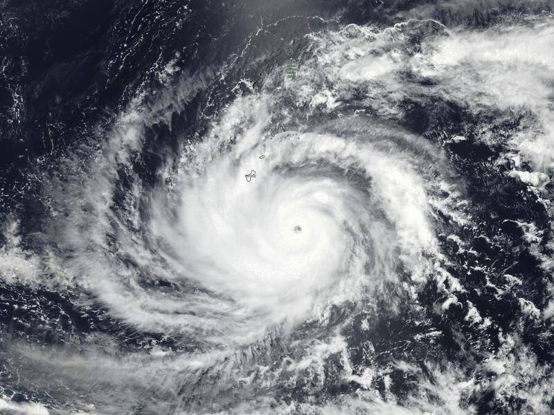 Powerful Typhoon Mawar has churned slowly over the US Pacific territory of Guam. (AP PHOTO)