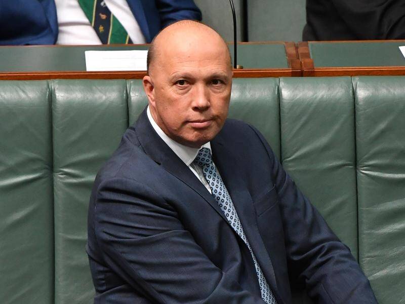Home Affairs Minister Peter Dutton will discuss disrupting child abuse networks while in the UK.