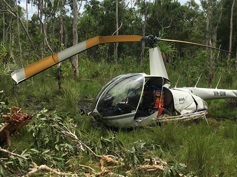 Chris Wilson was suspended 30 metres below a helicopter when it crashed in the Northern Territory.