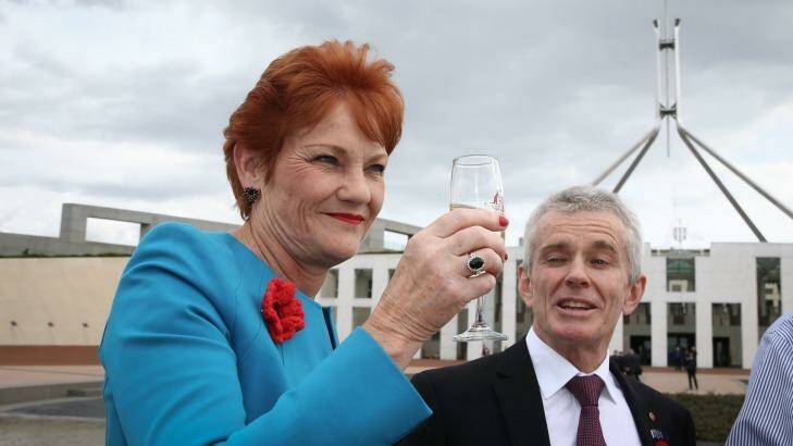 Pauline Hanson and fellow One Nation senator Malcolm Roberts celebrate Donald Trump's success. Photo: Alex Ellinghausen