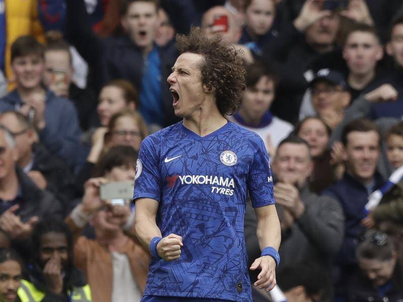 David Luiz has scored one of Chelsea's three goals against Huddersfield to lift them into third.