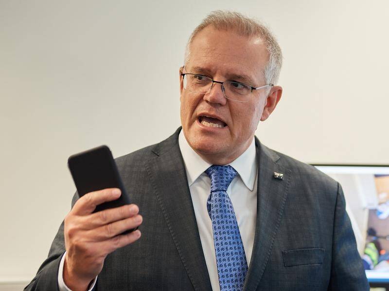 PM Scott Morrison has dismissed scrutiny of his friendship with a QAnon conspiracy theorist.