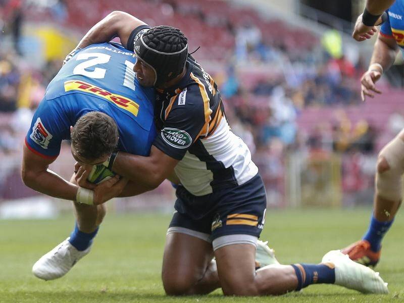 Brumbiess' Christian Lealiifano tackles Dan Kriel of the Stormers during their Super Rugby clash.