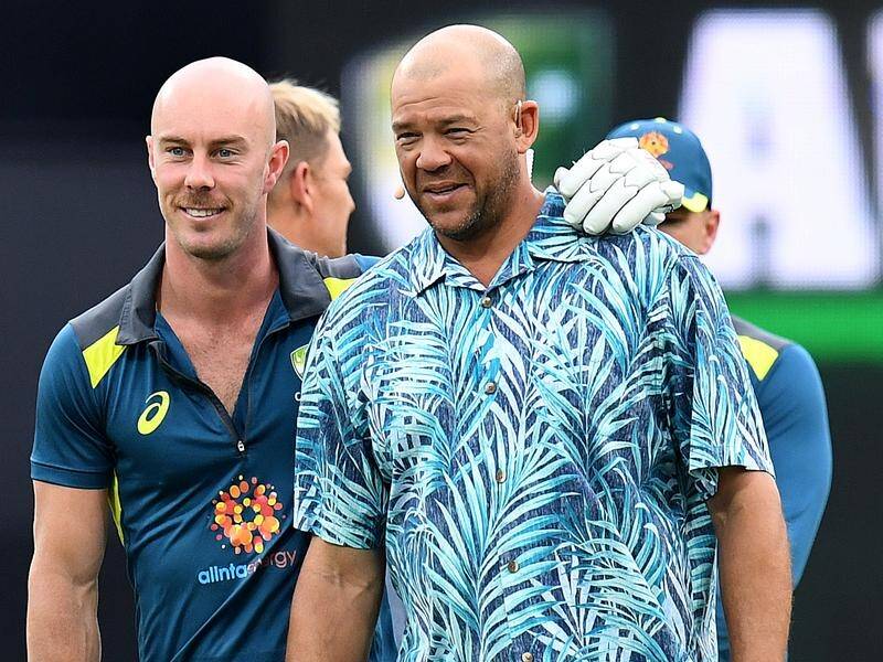 Australia batsman Chris Lynn and Andrew Symonds before a T20 international on the Gold Coast.