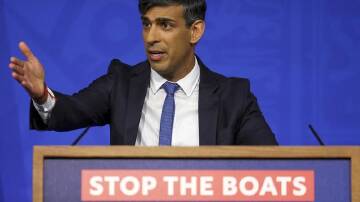 Stopping the flow of migrants is a priority for British Prime Minister Rishi Sunak's government. (AP PHOTO)