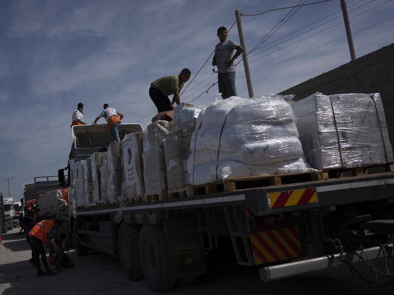 More trucks with humanitarian aid for the Gaza Strip have entered via the Rafah crossing from Egypt. (AP PHOTO)