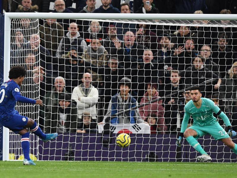 Chelsea's Willian nets his second goal from the penalty spot in the 2-0 defeat over Tottenham.