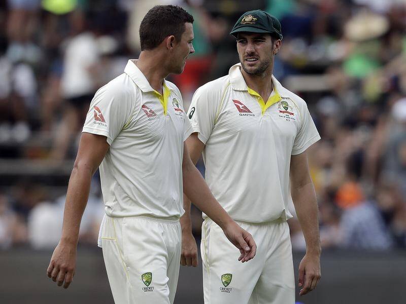 Injured duo Josh Hazlewood, left, and Pat Cummins will miss Australia's test series with Pakistan.