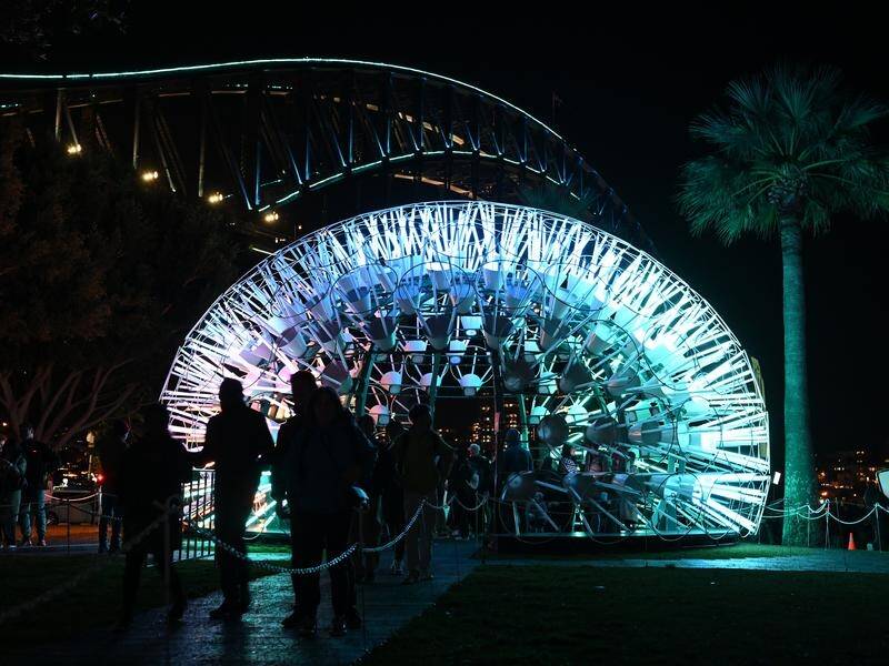 Two men have been charged with damage to electric light fixtures at Sydney's Vivid festival. (Dean Lewins/AAP PHOTOS)